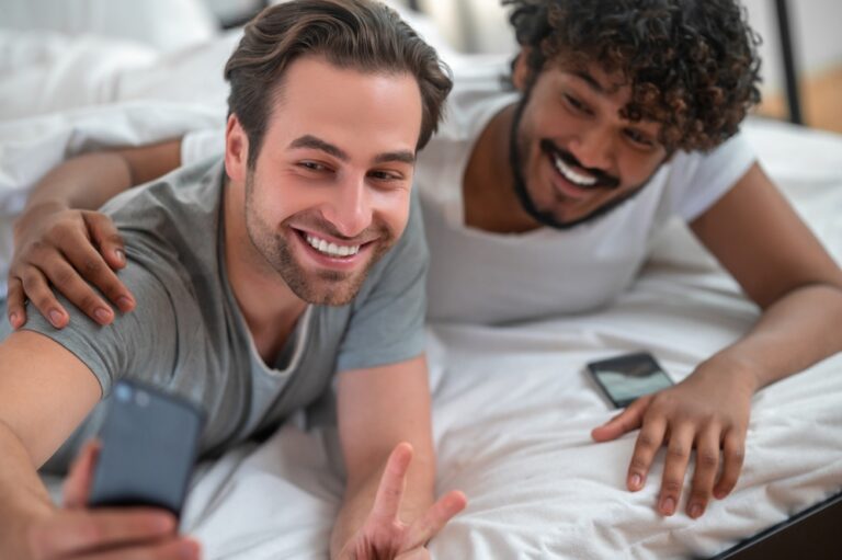 Cheerful,Young,Biracial,Gay,Couple,Taking,Selfies