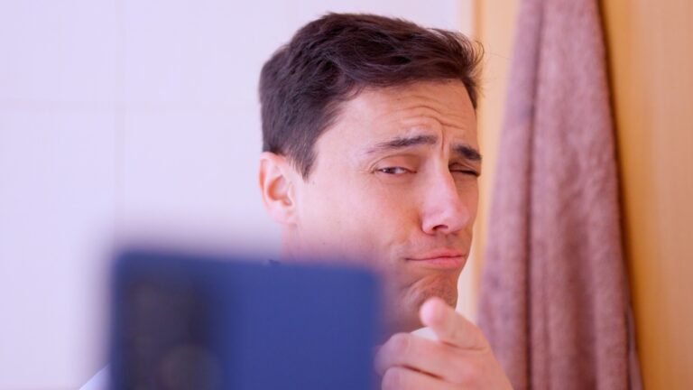 Narcissistic,Man,Taking,Selfies,In,Bathroom,Mirror,With,Smartphone